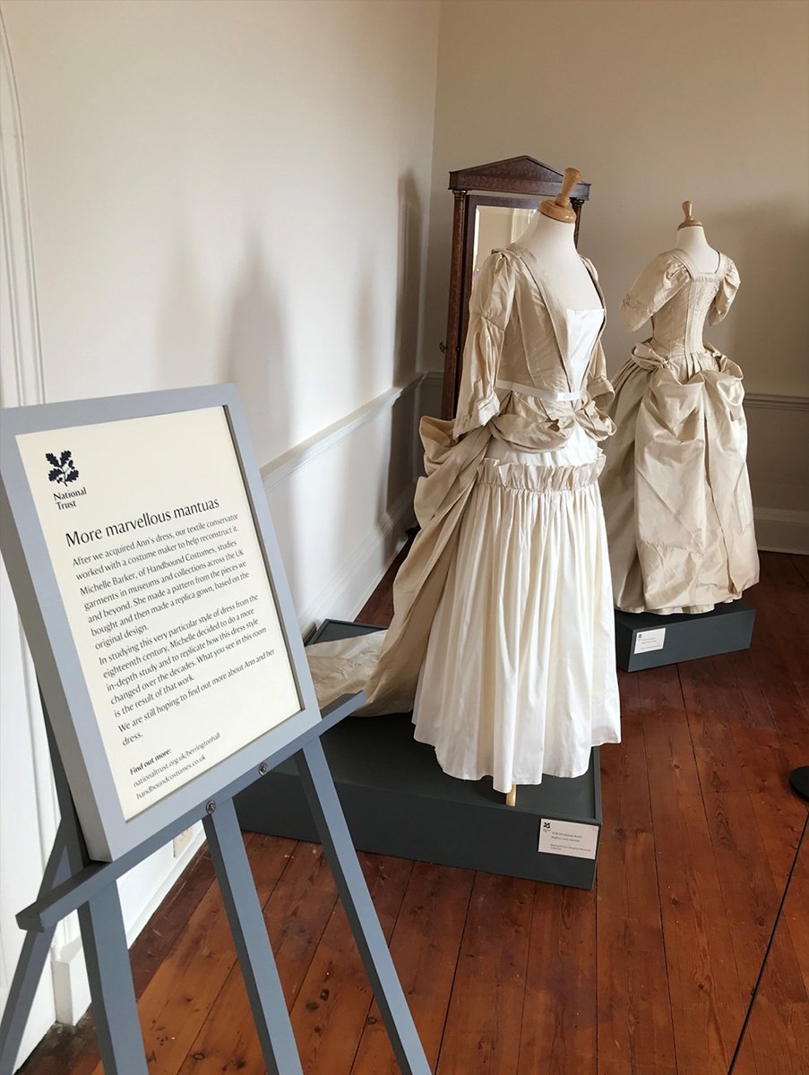 Two cream Mantua dresses in the ‘A Dress Fit for a King’ exhibition at Berrington Hall.    Two cream Mantua dresses in the ‘A Dress Fit for a King’ exhibition at Berrington Hall.