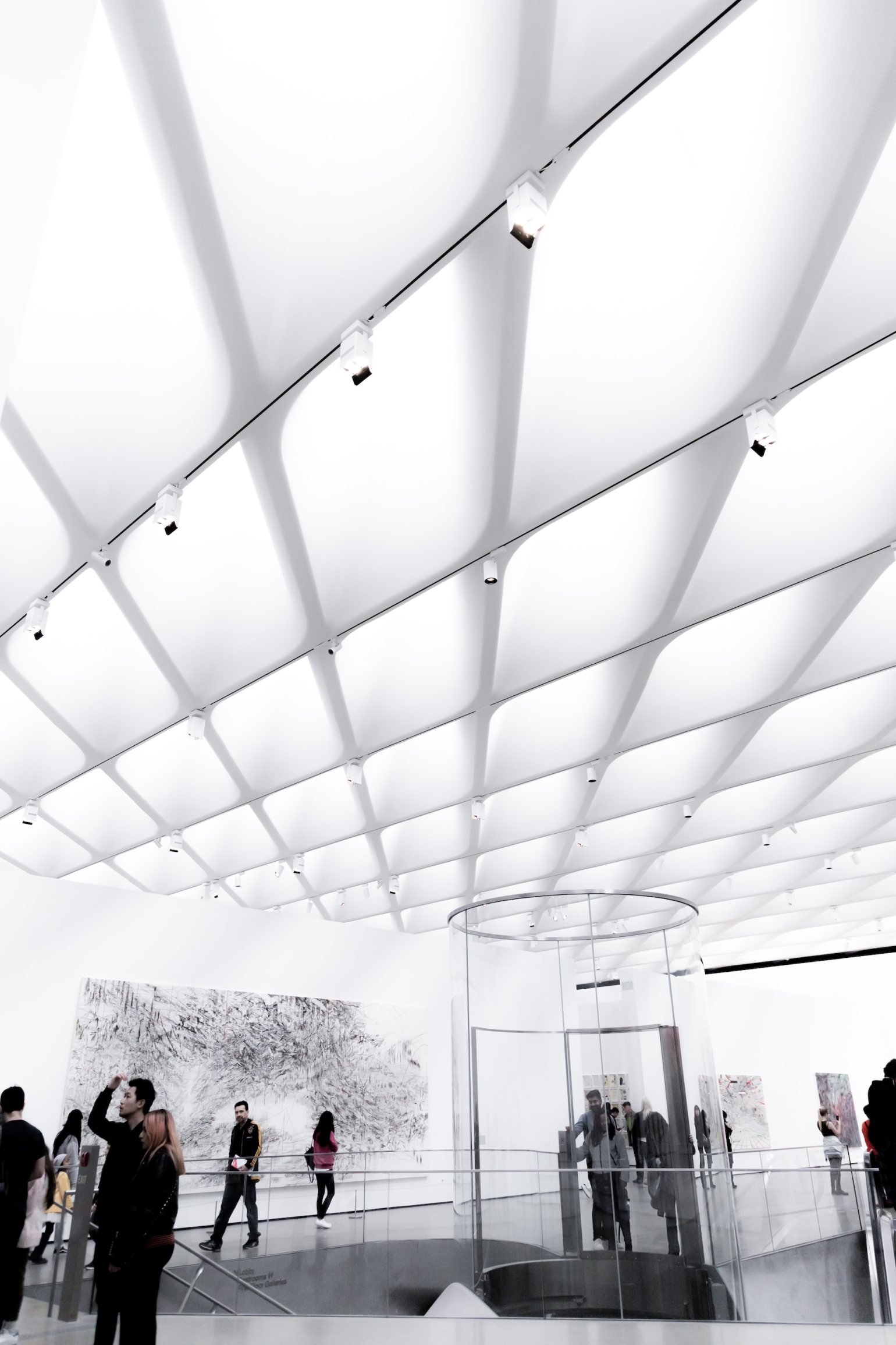 Inside The Broad Museum, LA, featuring striking white architecture and glass elevator.  Inside The Broad Museum, LA, featuring striking white architecture and glass elevator.