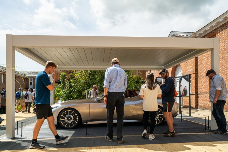 Silver sports car at Goodwood Festival of Speed, protected by Absolute Surface Mounted Barrier in black Silver sports car at Goodwood Festival of Speed, protected by Absolute Surface Mounted Barrier in black