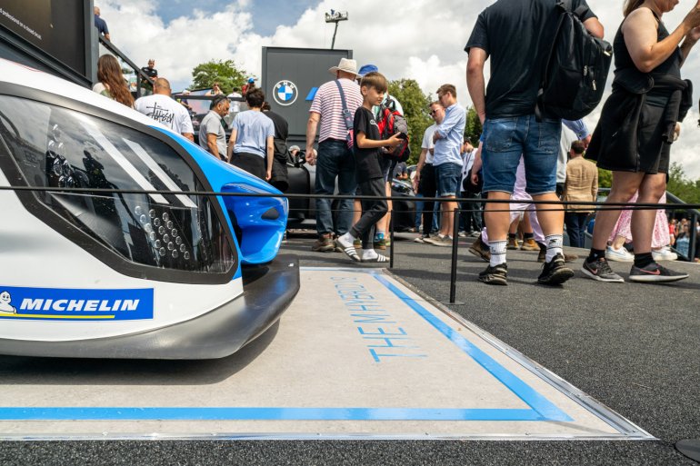 Race car at Goodwood Festival of Speed, protected by Absolute Surface Mounted Barrier in black Race car at Goodwood Festival of Speed, protected by Absolute Surface Mounted Barrier in black