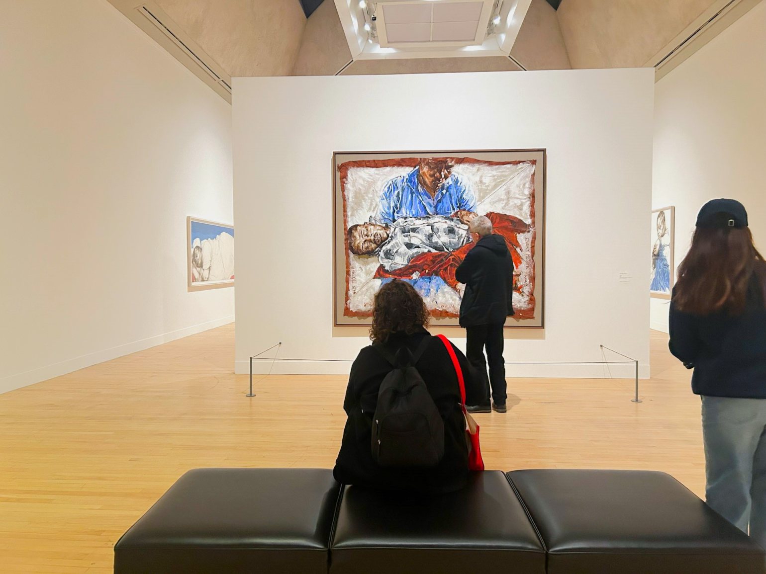 People viewing the Claudette Johnson area of the Turner Prize 2024 exhibition at Tate Britain.