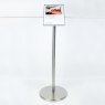 Stainless steel Freestanding Q Barrier with signage plate and elasticated barrier cord.