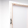 White canvas board (back) with Ryman hanger attached.