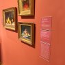 Artworks featured in the Museum of Fine Arts, USA, and label holders containing correlating information.