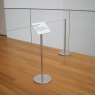 An art gallery using Freestanding Q Barriers with signage plate and barrier cord, restricting access to an exhibition install